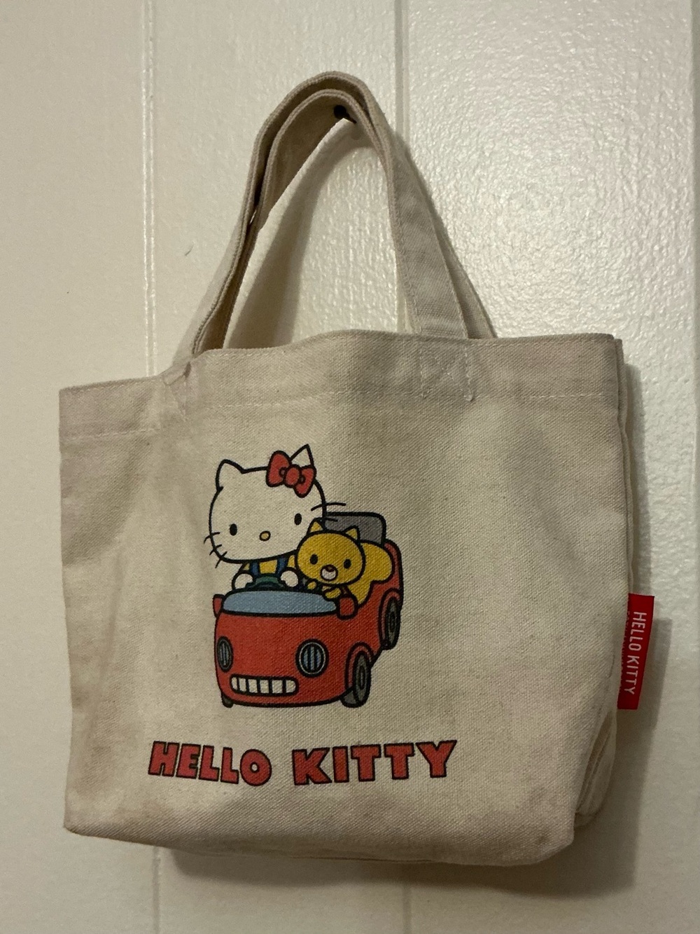 a Sanrio Hello Kitty 50th Anniversary canvas mini tote bag